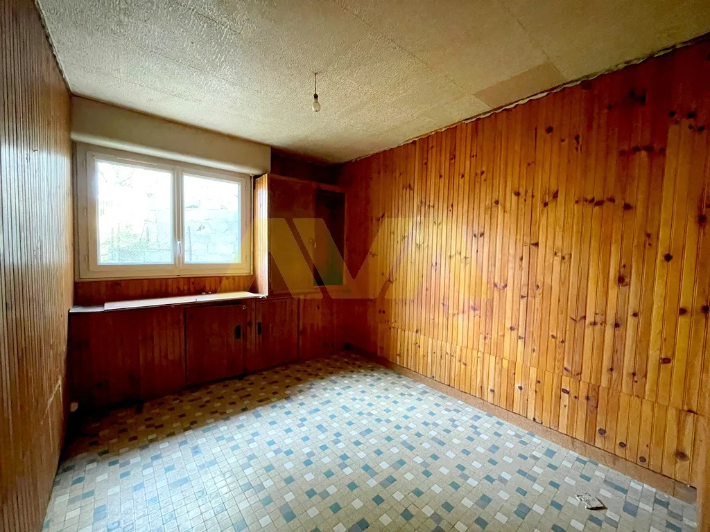 Maison mitoyenne des années 60 à Garindein 