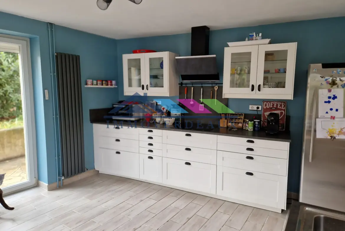 Maison rénovée à Drouville avec 4 chambres, jardin et terrasse 