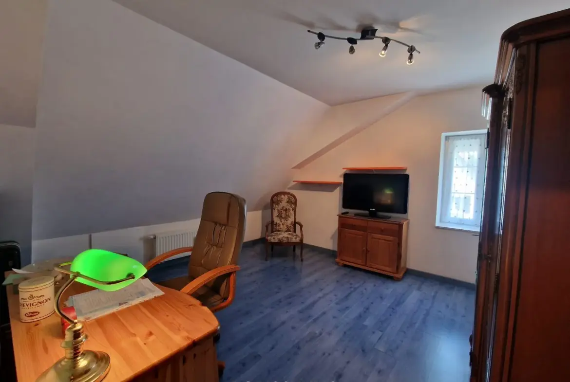 À vendre : Triplex soigné à Bettendorf avec terrasse ensoleillée 