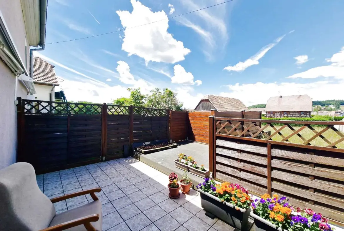 À vendre : Triplex soigné à Bettendorf avec terrasse ensoleillée 