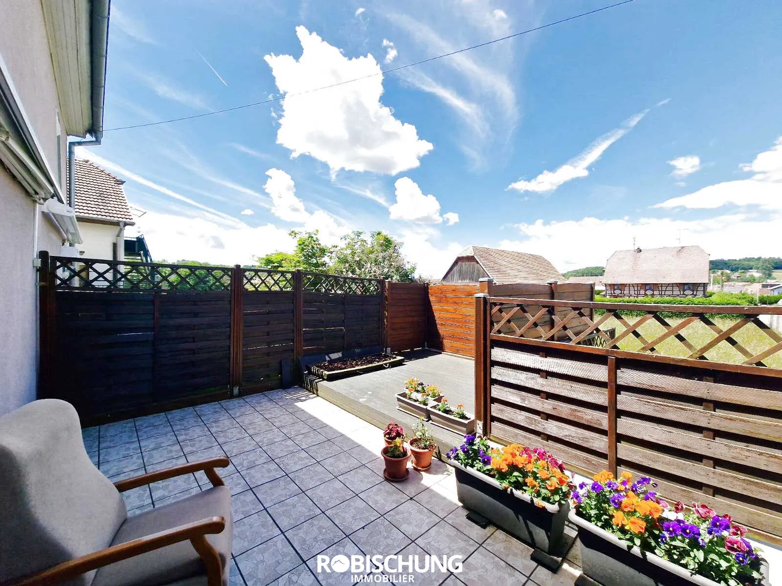À vendre : Triplex soigné à Bettendorf avec terrasse ensoleillée 