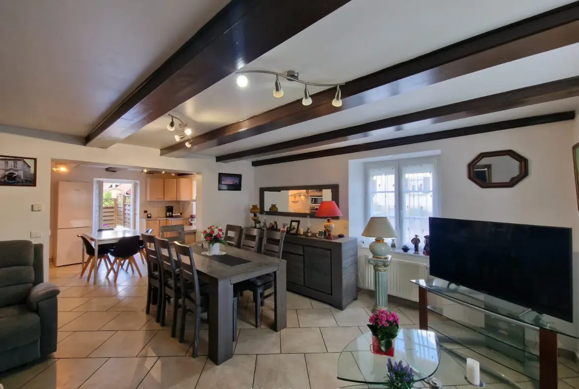 À vendre : Triplex soigné à Bettendorf avec terrasse ensoleillée 