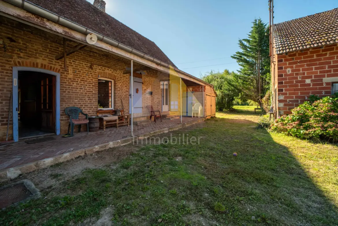 Longère mitoyenne avec dépendances à Frangy-en-Bresse 