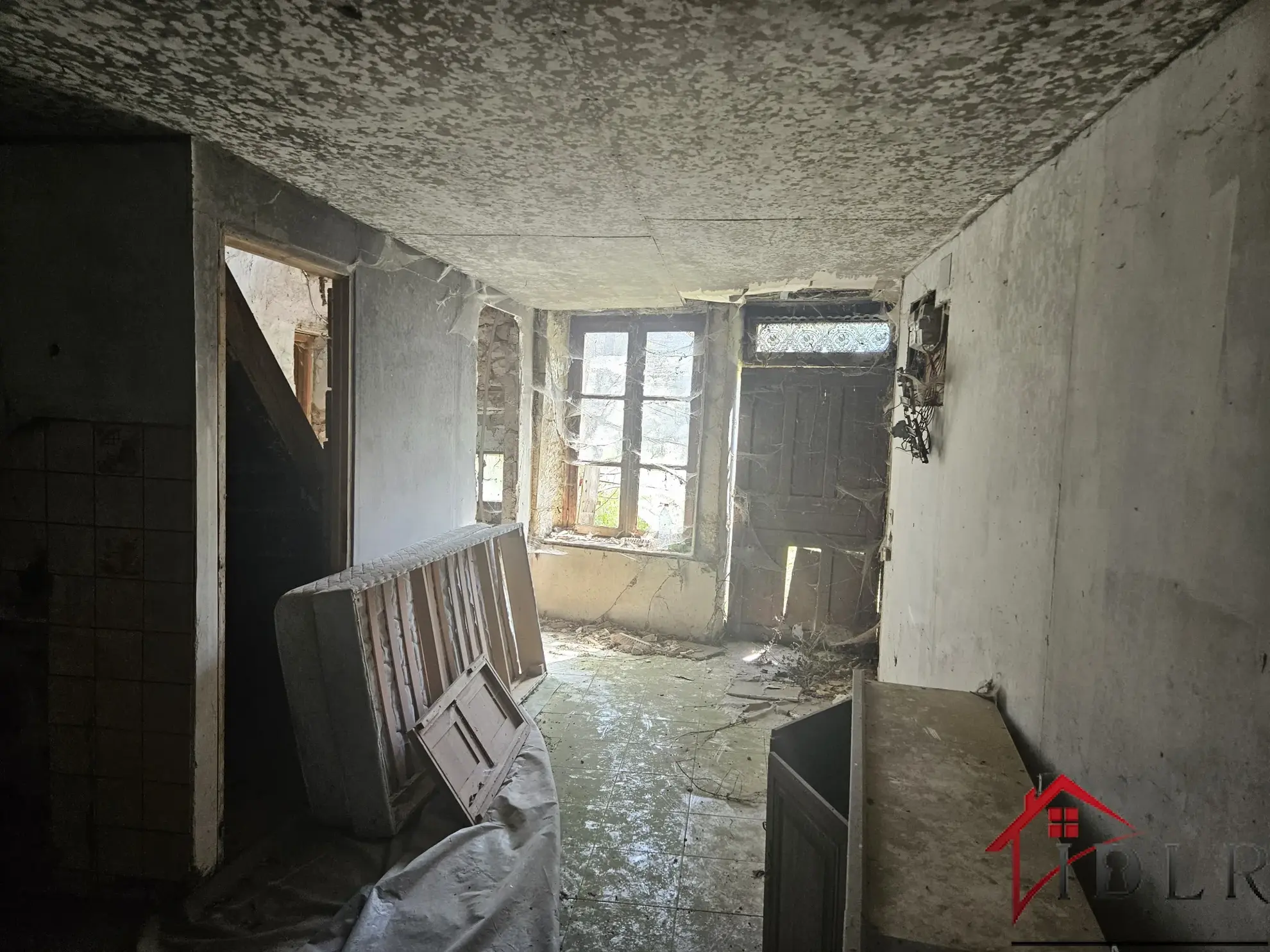 Ensemble immobilier à rénover de 2 habitations sur terrain de 1520 m² 