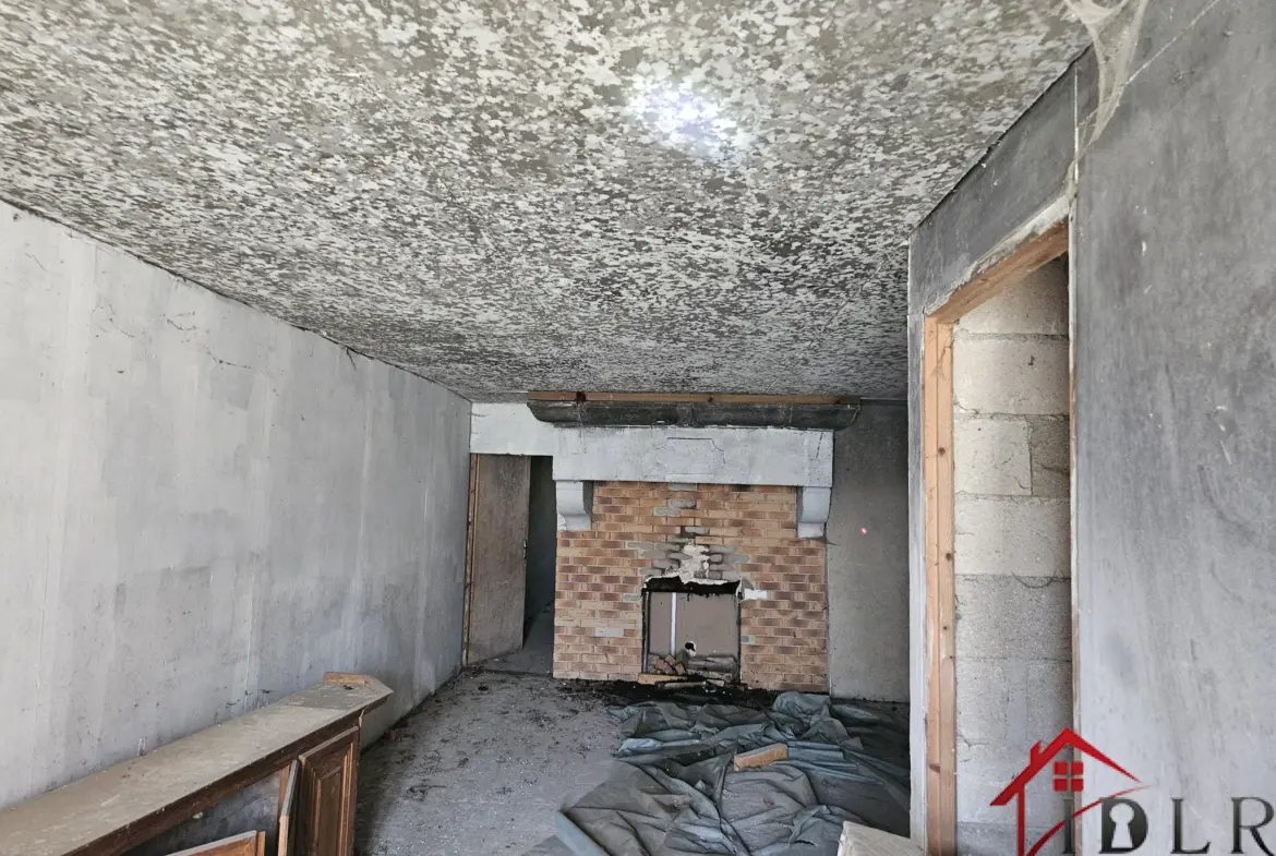Ensemble immobilier à rénover de 2 habitations sur terrain de 1520 m² 