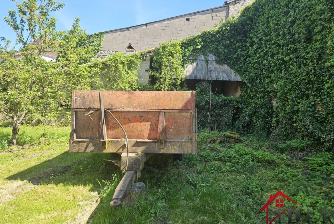 Ensemble immobilier à rénover de 2 habitations sur terrain de 1520 m² 