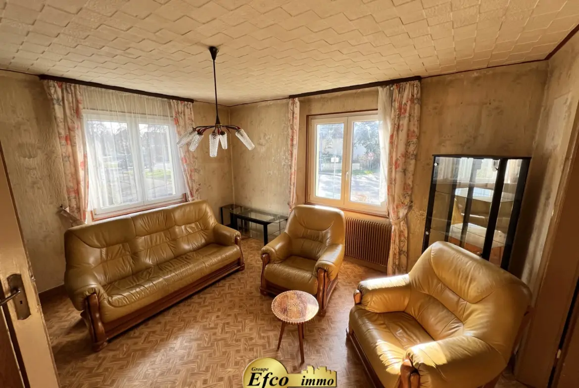 Maison mitoyenne 6 pièces à Pfastatt avec jardin et garage 