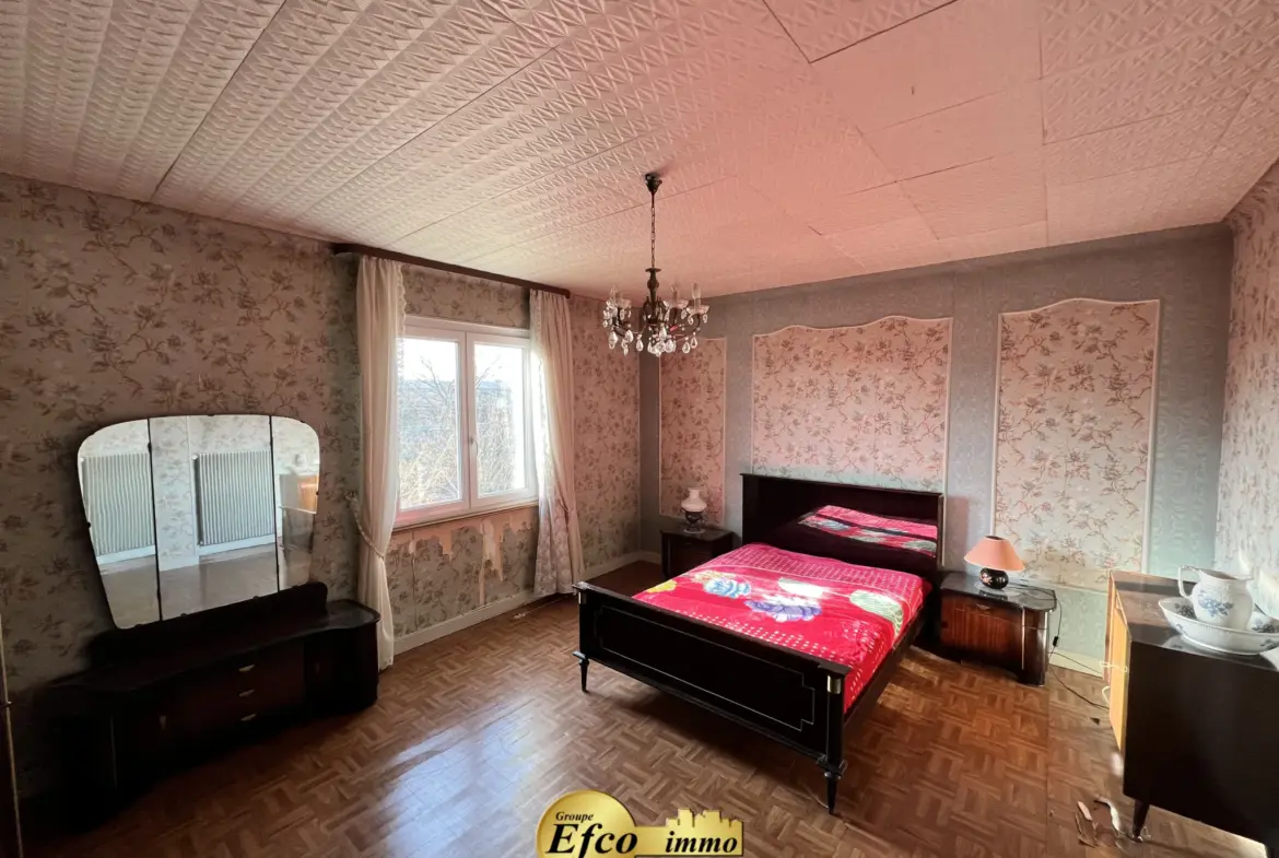 Maison mitoyenne 6 pièces à Pfastatt avec jardin et garage 