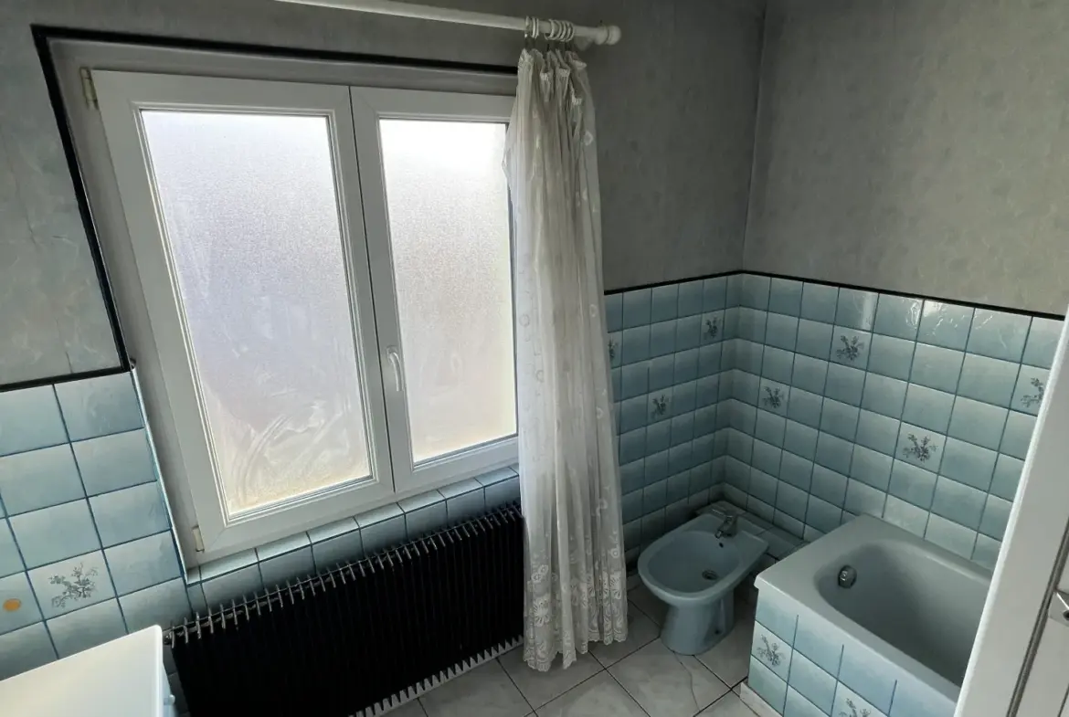 Maison mitoyenne 6 pièces à Pfastatt avec jardin et garage 