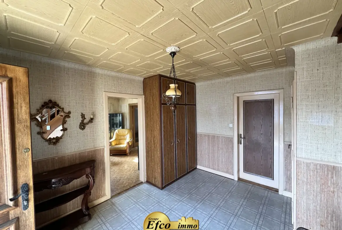 Maison mitoyenne 6 pièces à Pfastatt avec jardin et garage 