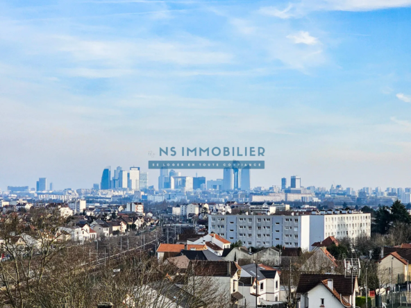 Appartement F4 avec Loggia et Vue sur La Défense à Houilles 