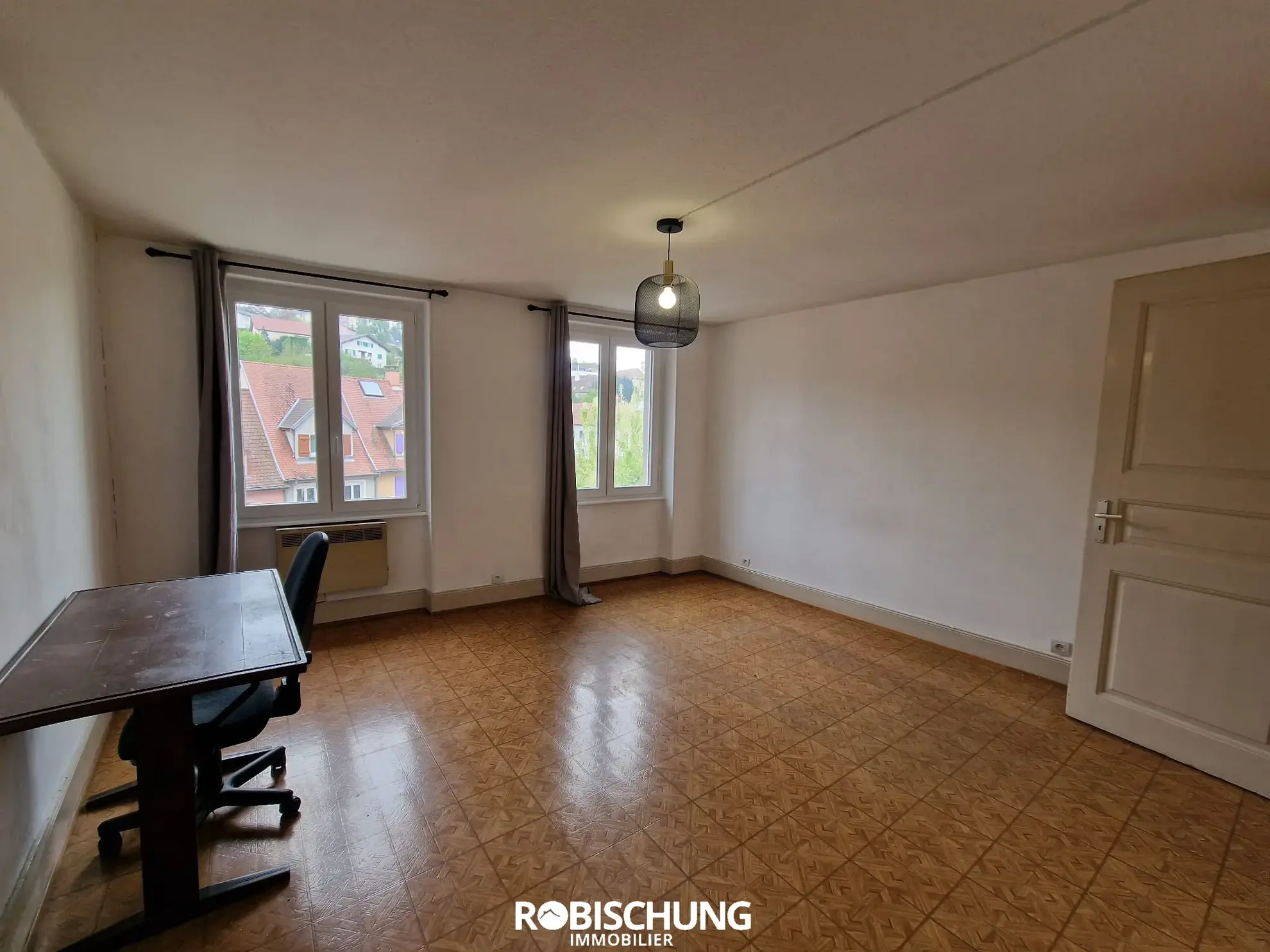 Maison de Ville à Altkirch avec 2 Appartements Loués 