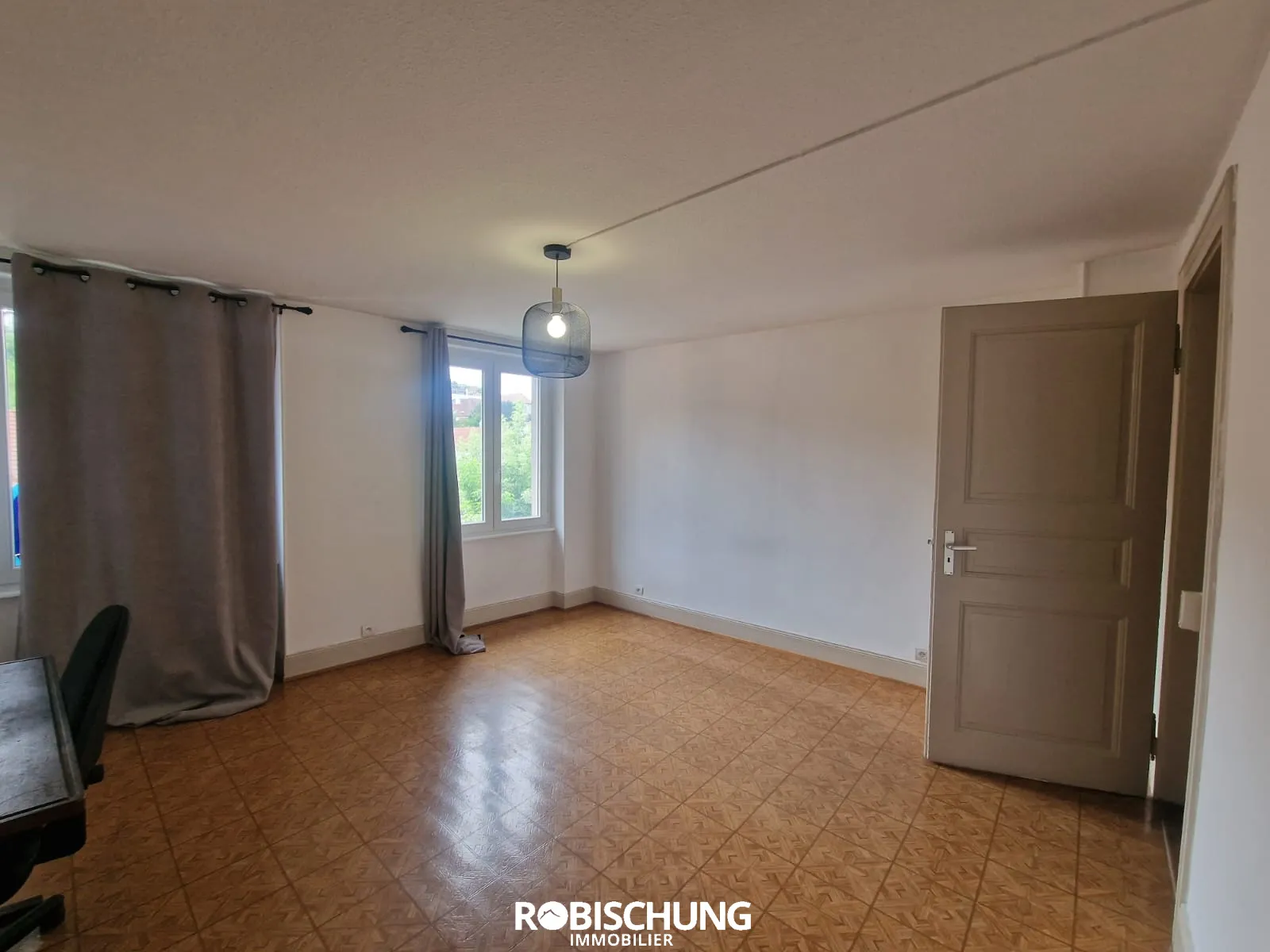 Maison de Ville à Altkirch avec 2 Appartements Loués 