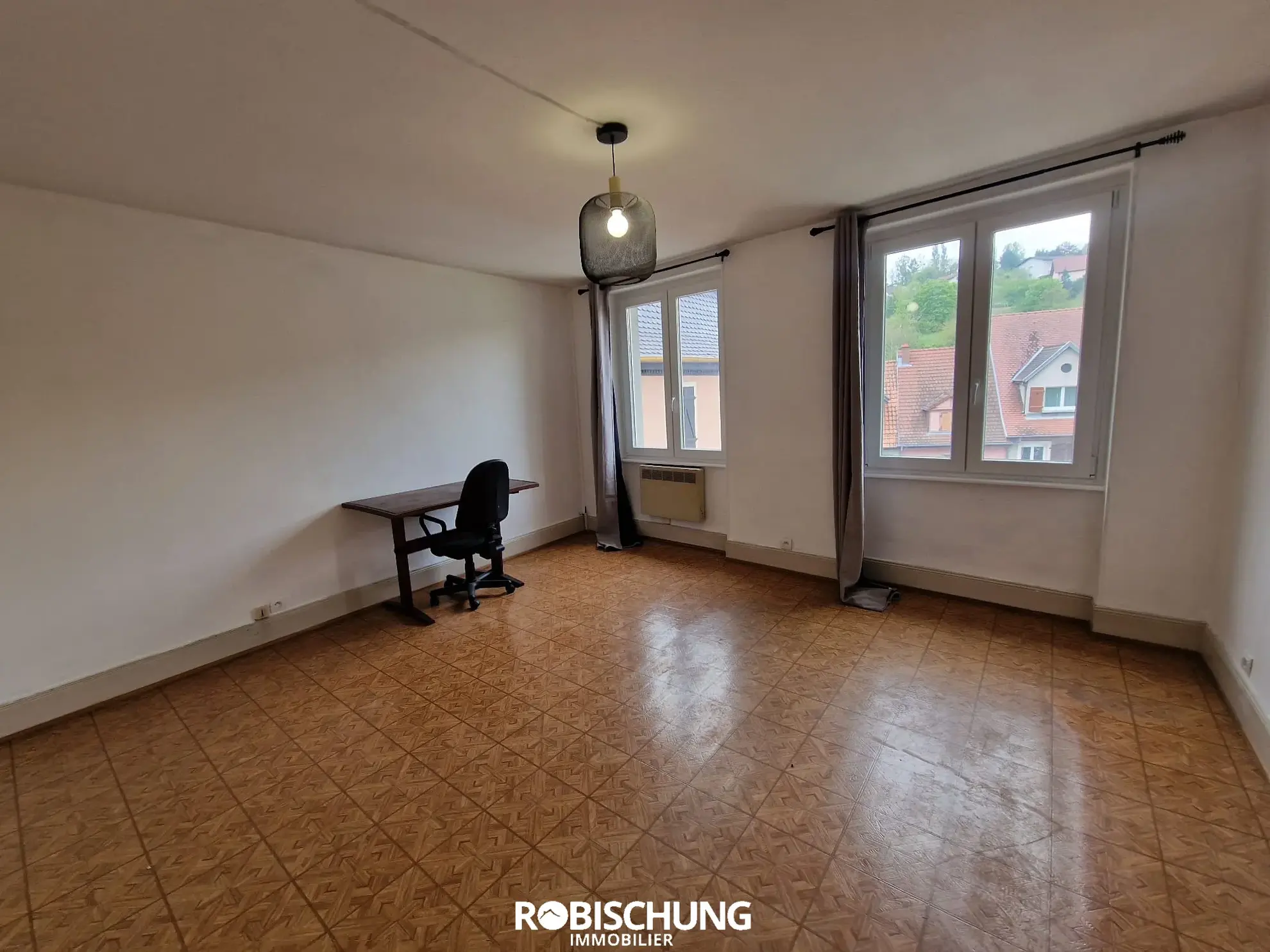 Maison de Ville à Altkirch avec 2 Appartements Loués 