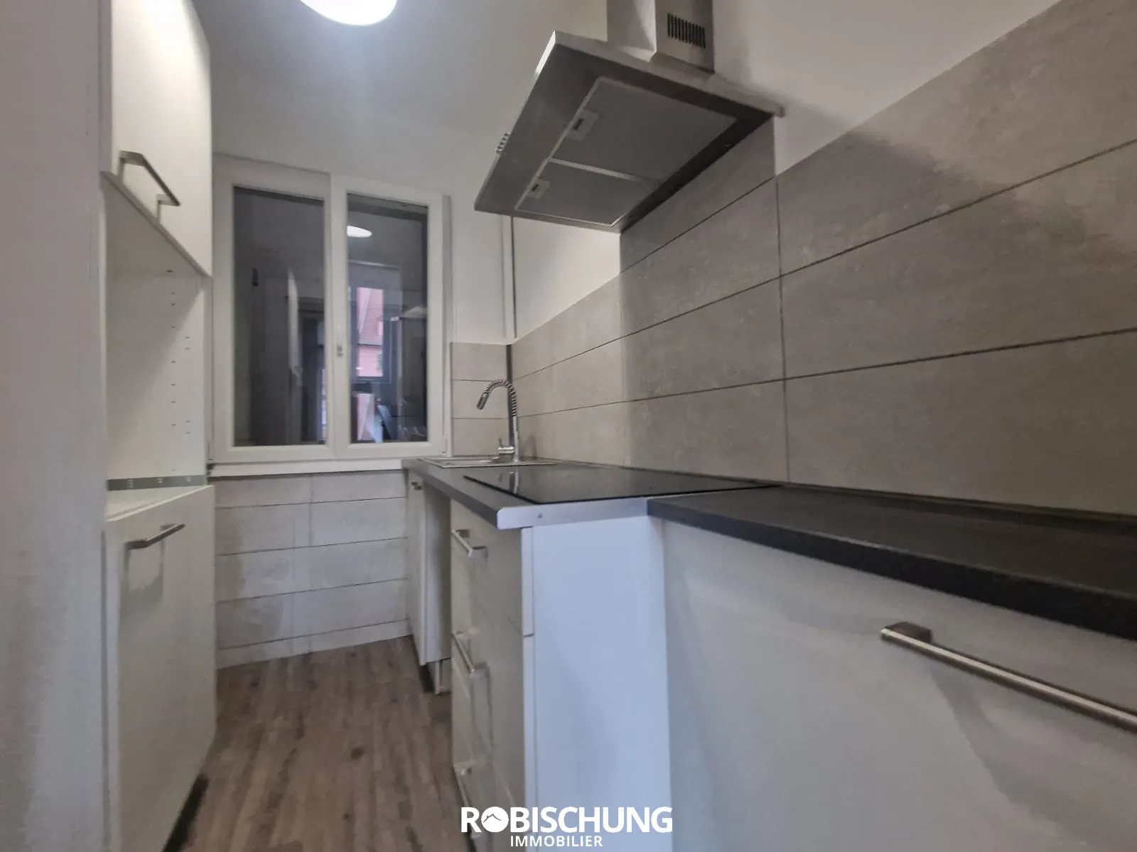 Maison de Ville à Altkirch avec 2 Appartements Loués 