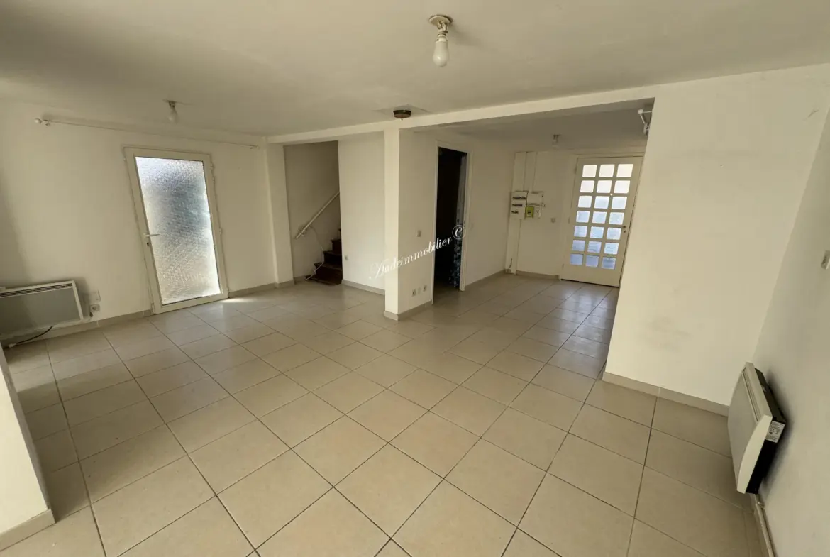 À vendre : Ensemble de deux maisons avec jardins à Couiza 