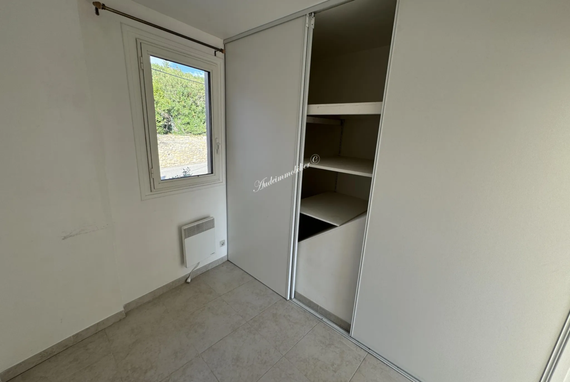 À vendre : Ensemble de deux maisons avec jardins à Couiza 