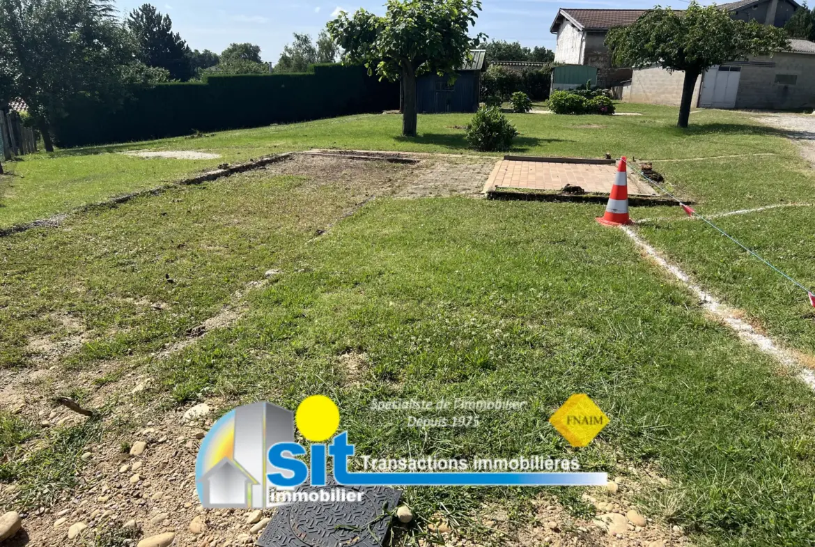 Terrain constructible à Seyssuel avec dépôt de 70 m² 