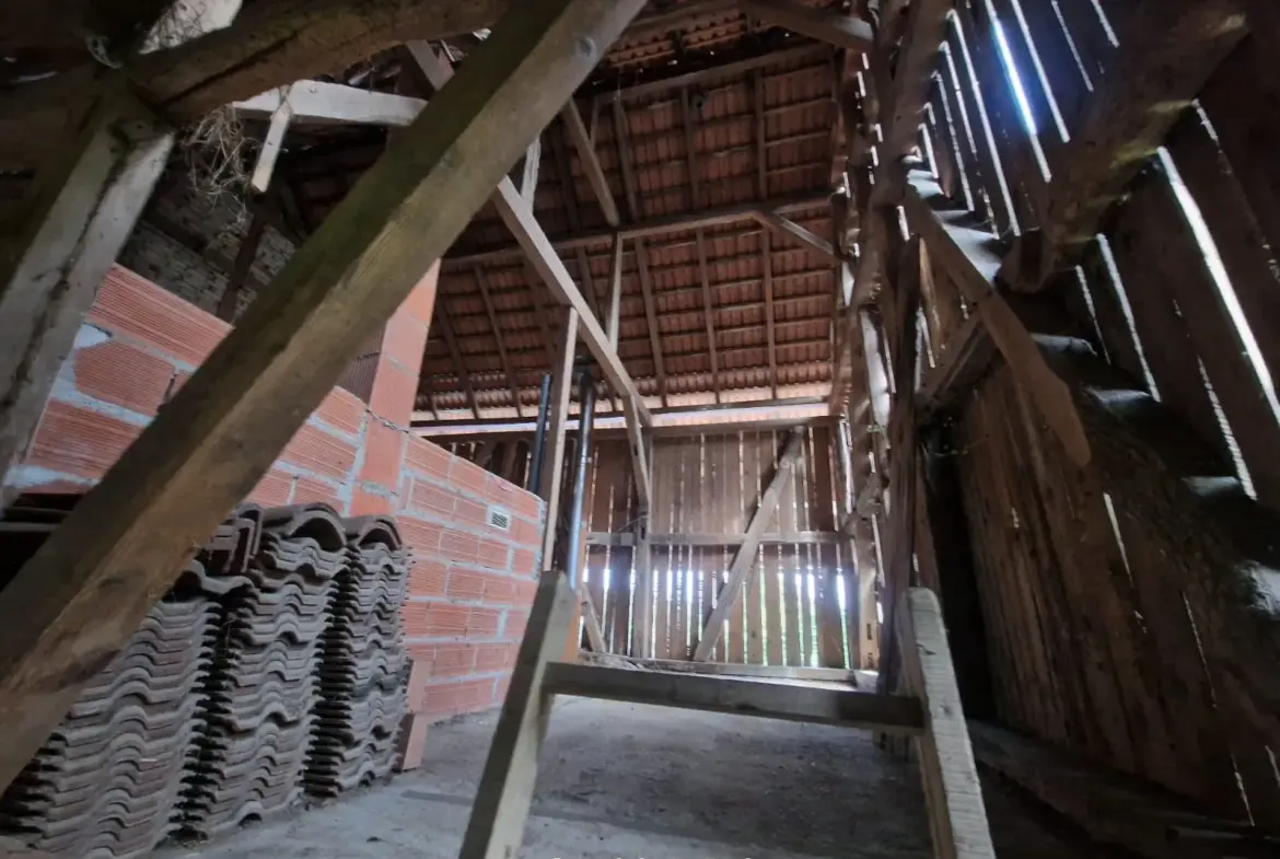 Maison à Heimersdorf en lisière de forêt avec fort potentiel 