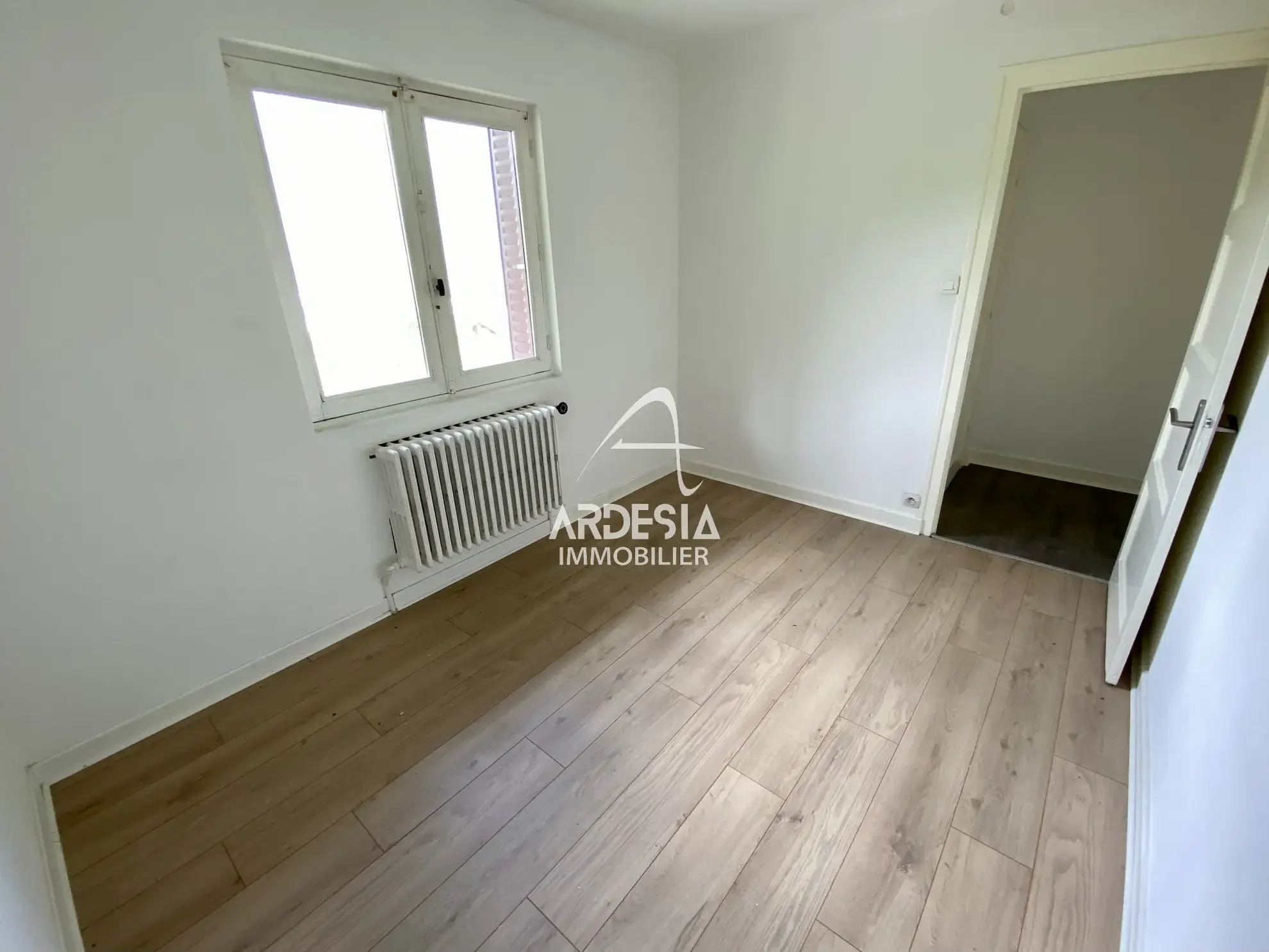 À Vendre : Appartement T3 avec Jardin et Garage à Saint-Julien-Mont-Denis 