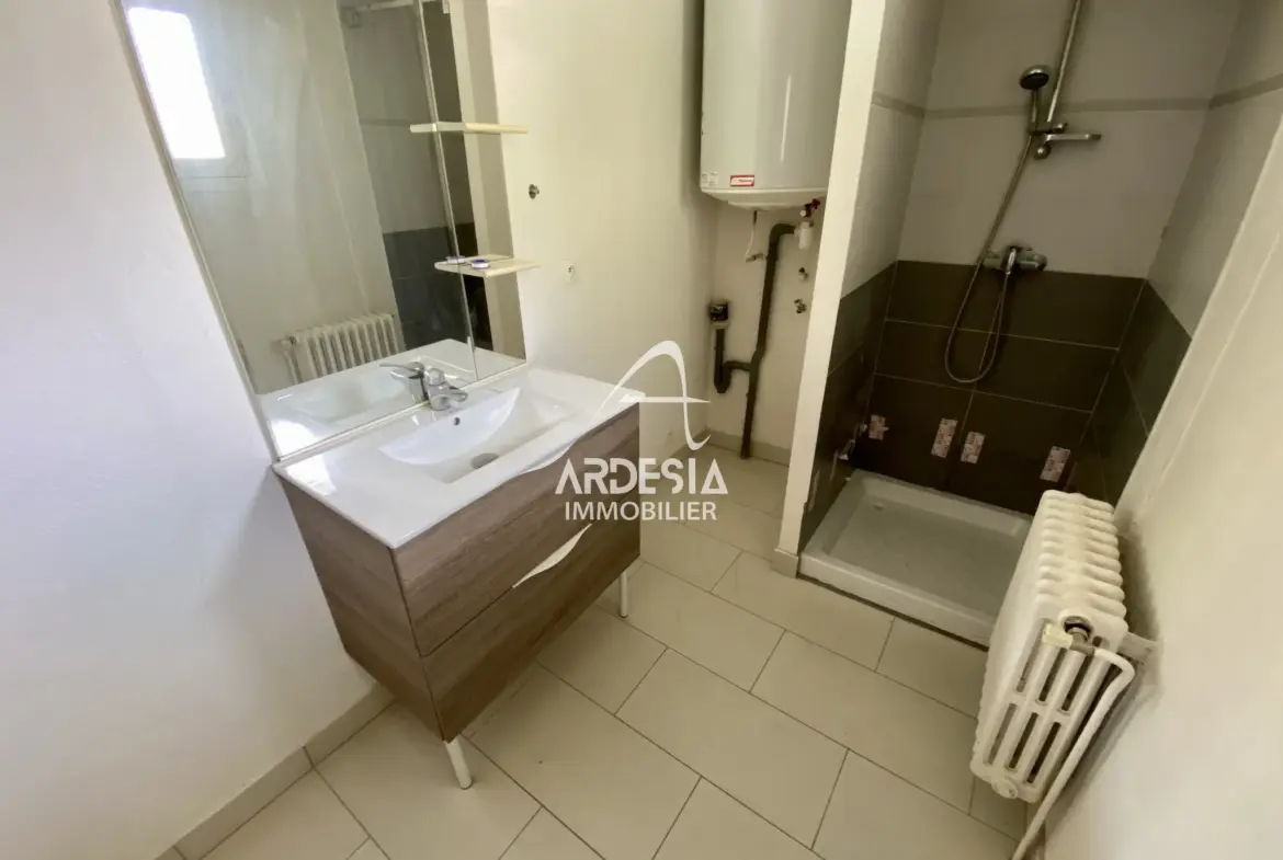 À Vendre : Appartement T3 avec Jardin et Garage à Saint-Julien-Mont-Denis 