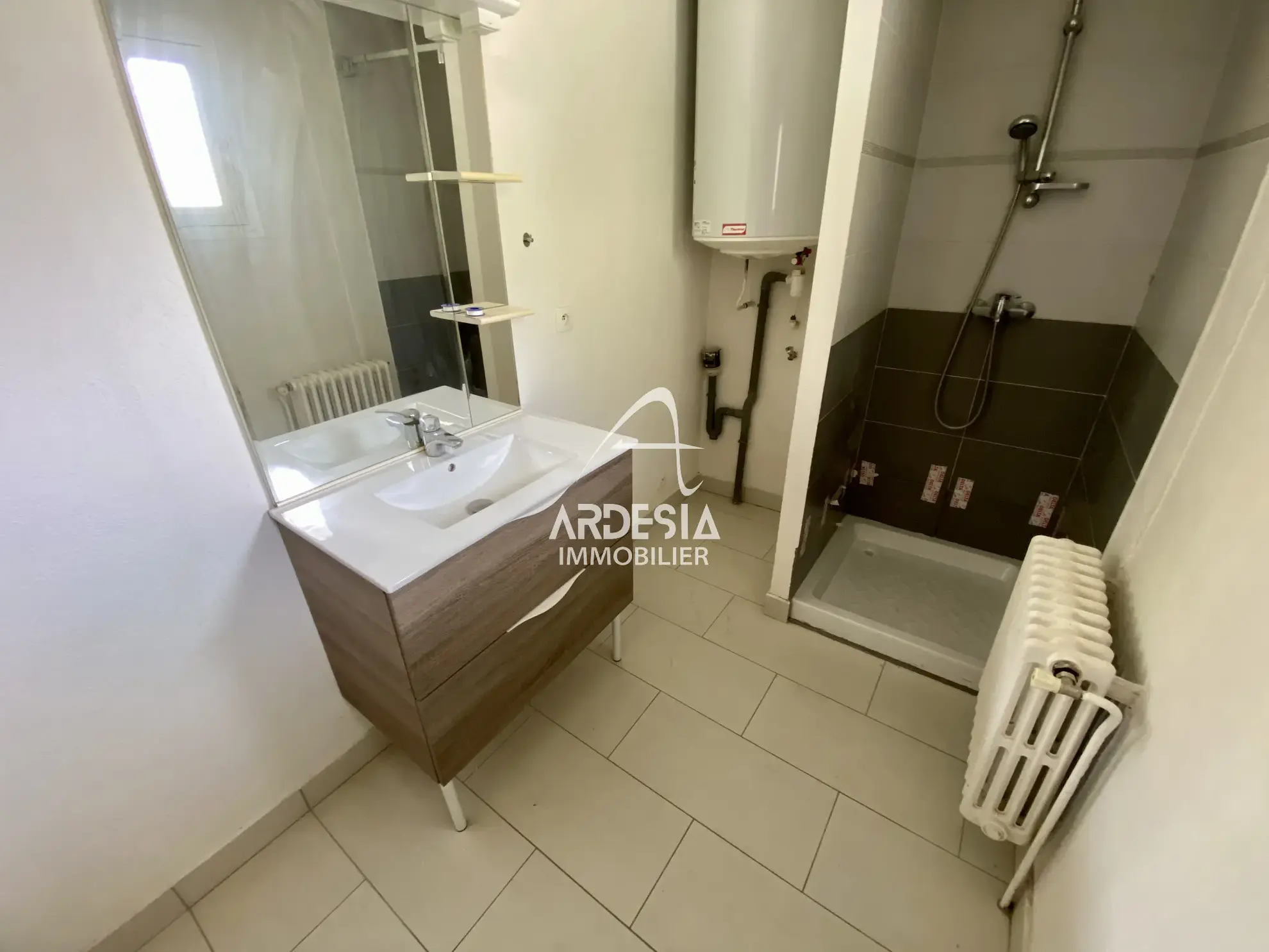 À Vendre : Appartement T3 avec Jardin et Garage à Saint-Julien-Mont-Denis 