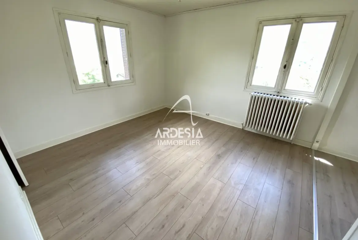 À Vendre : Appartement T3 avec Jardin et Garage à Saint-Julien-Mont-Denis 