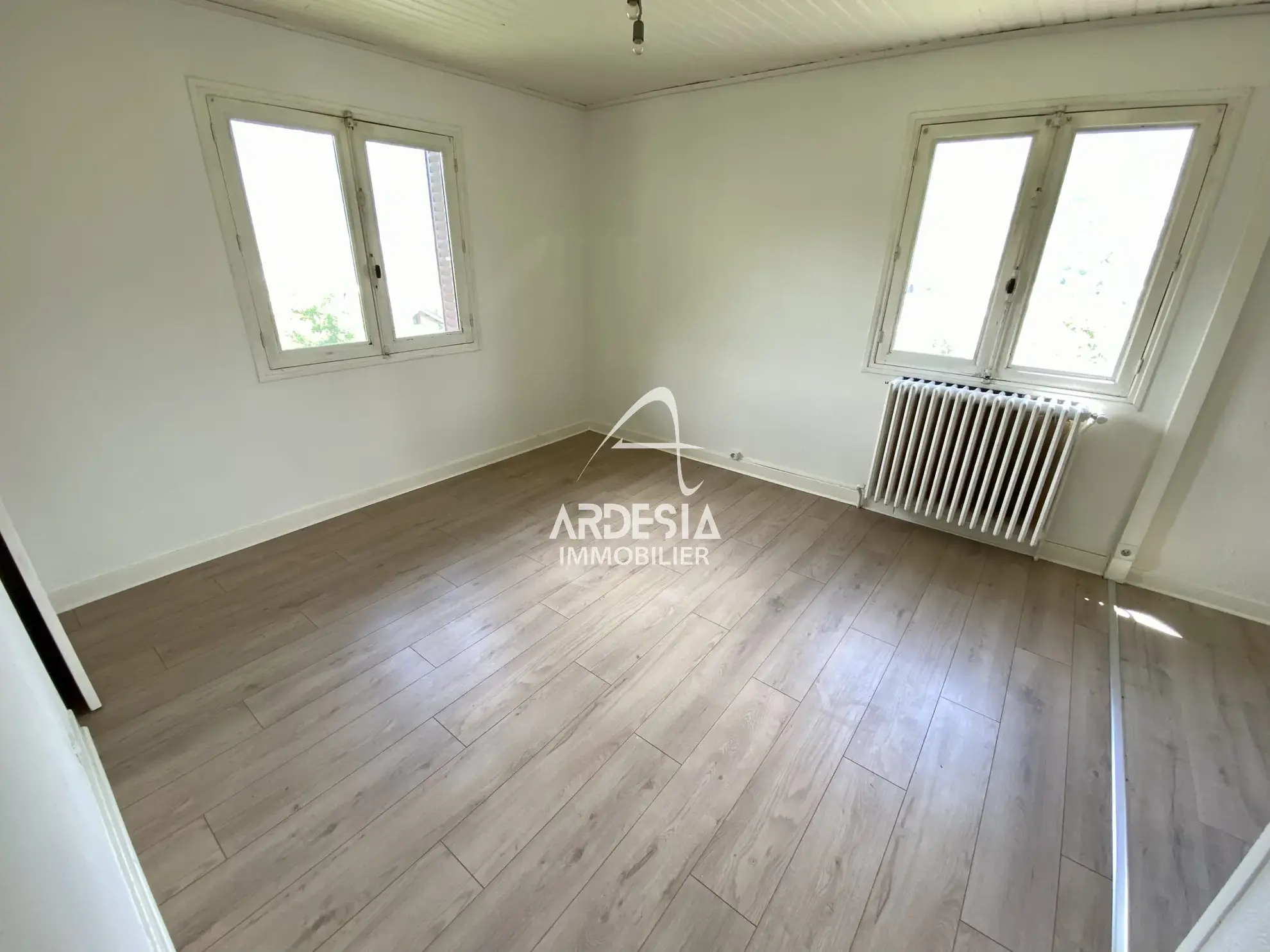 À Vendre : Appartement T3 avec Jardin et Garage à Saint-Julien-Mont-Denis 