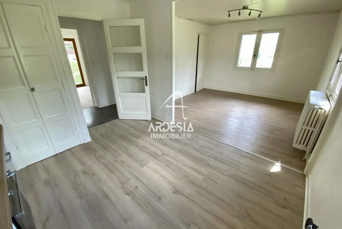À Vendre : Appartement T3 avec Jardin et Garage à Saint-Julien-Mont-Denis 