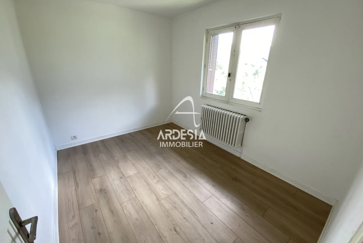 À Vendre : Appartement T3 avec Jardin et Garage à Saint-Julien-Mont-Denis 