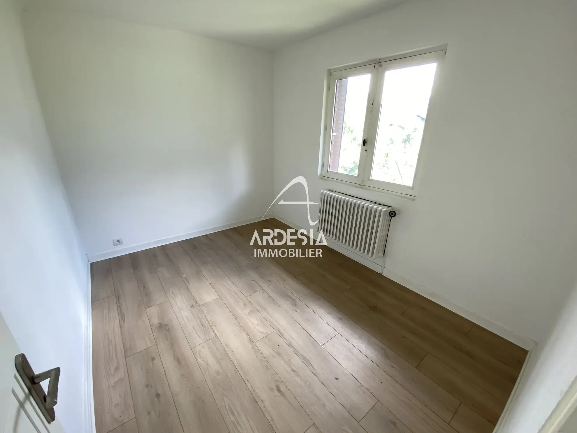 À Vendre : Appartement T3 avec Jardin et Garage à Saint-Julien-Mont-Denis 