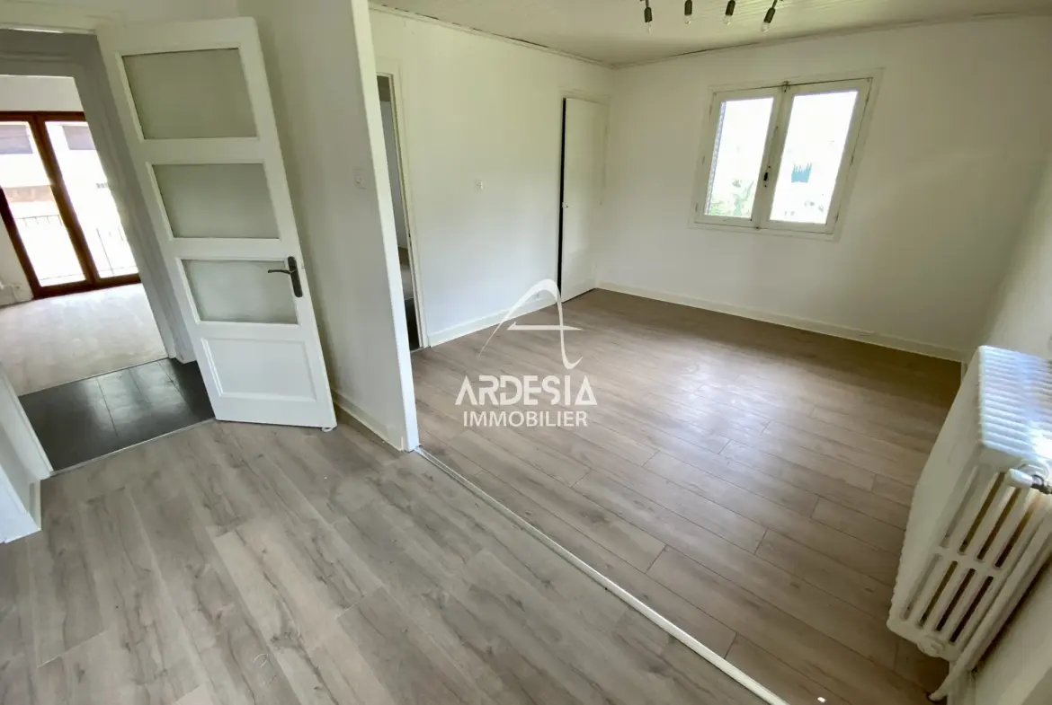 À Vendre : Appartement T3 avec Jardin et Garage à Saint-Julien-Mont-Denis 