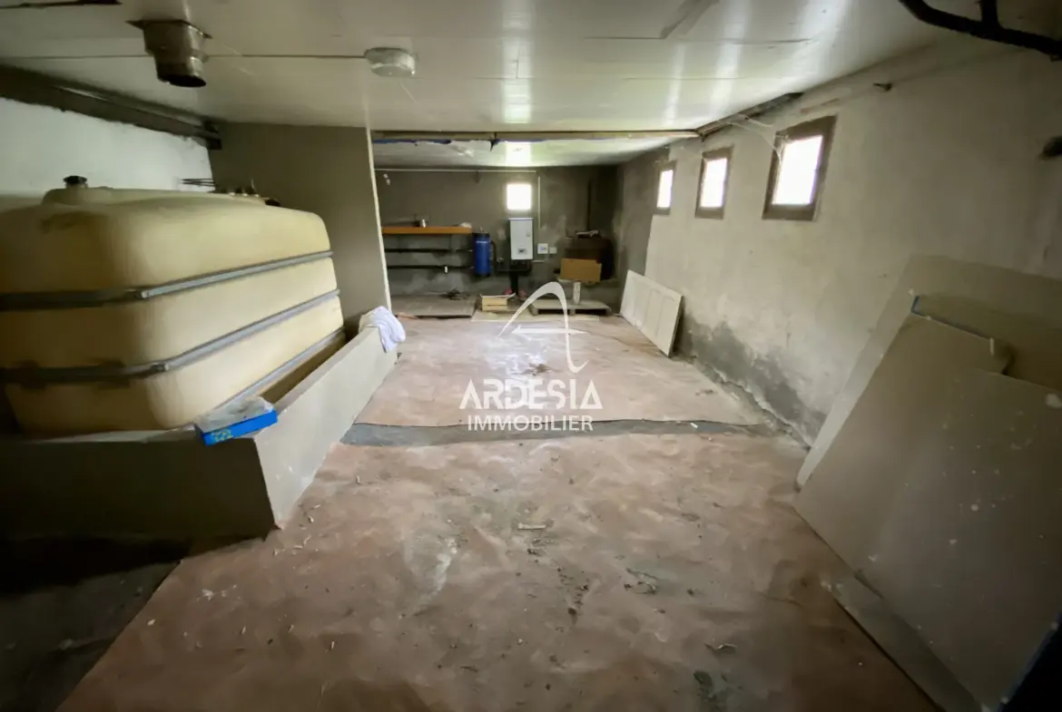 À Vendre : Appartement T3 avec Jardin et Garage à Saint-Julien-Mont-Denis 