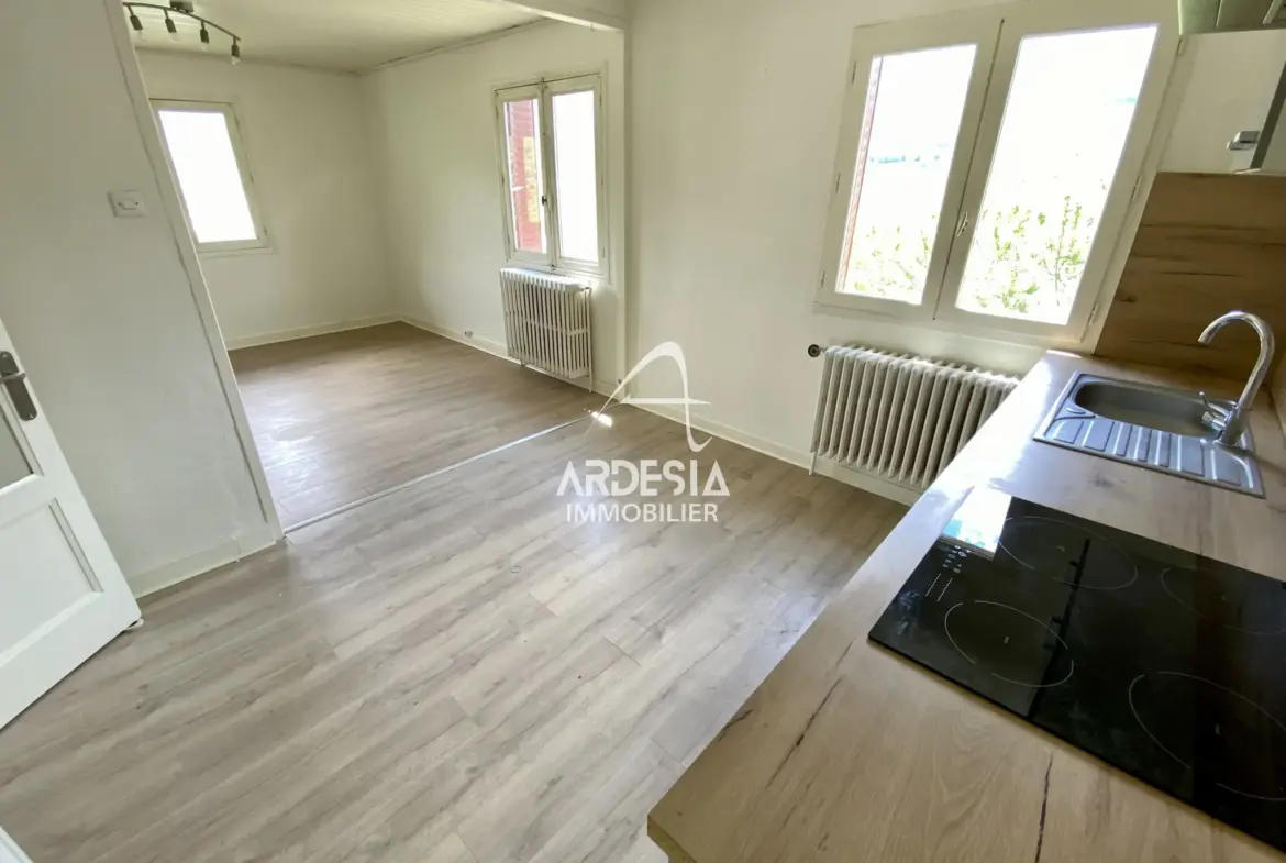 À Vendre : Appartement T3 avec Jardin et Garage à Saint-Julien-Mont-Denis 