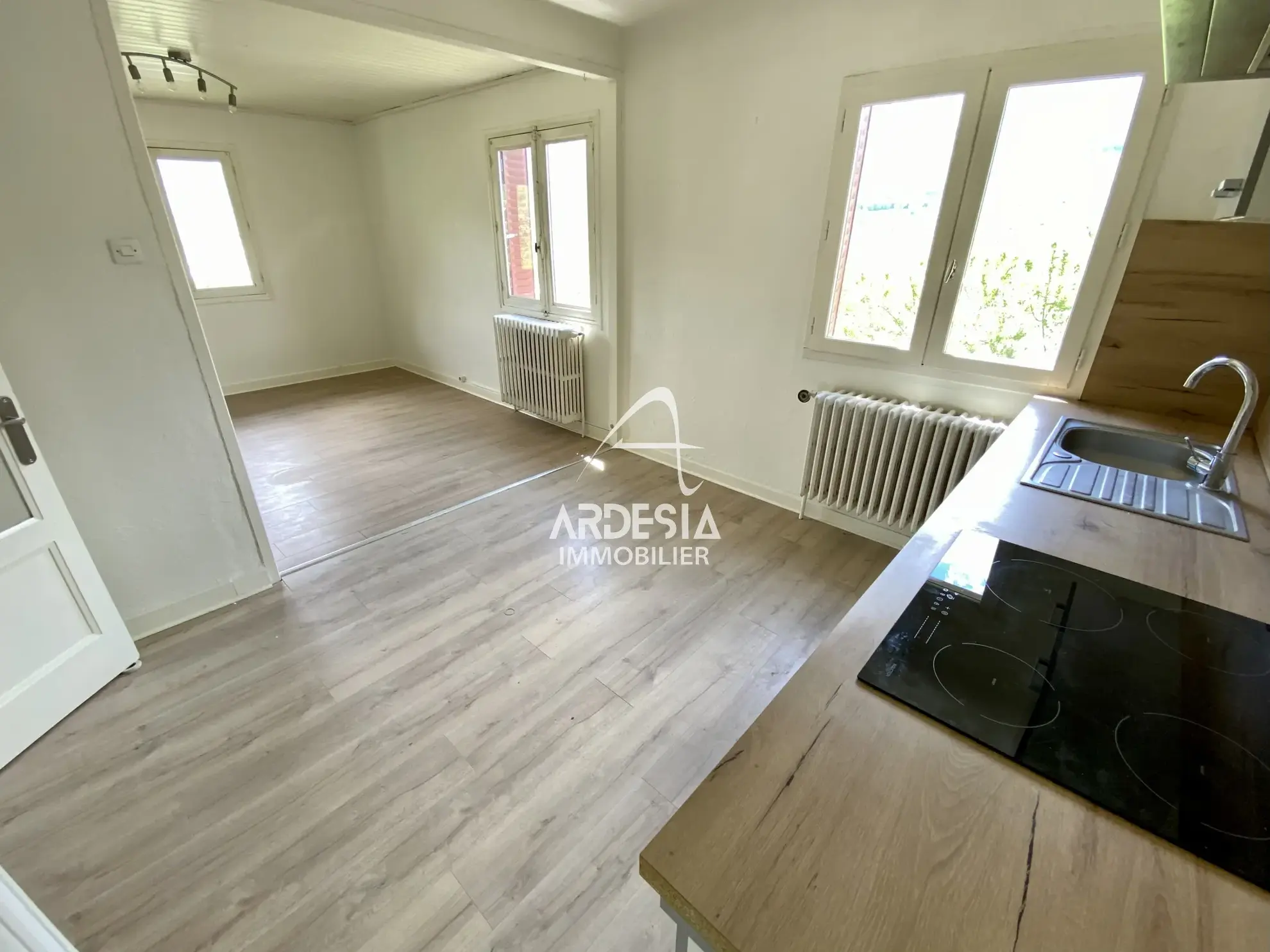 À Vendre : Appartement T3 avec Jardin et Garage à Saint-Julien-Mont-Denis 
