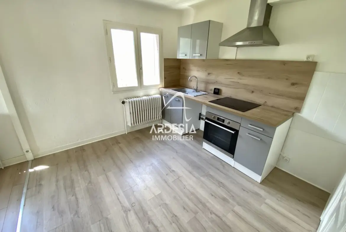 À Vendre : Appartement T3 avec Jardin et Garage à Saint-Julien-Mont-Denis 
