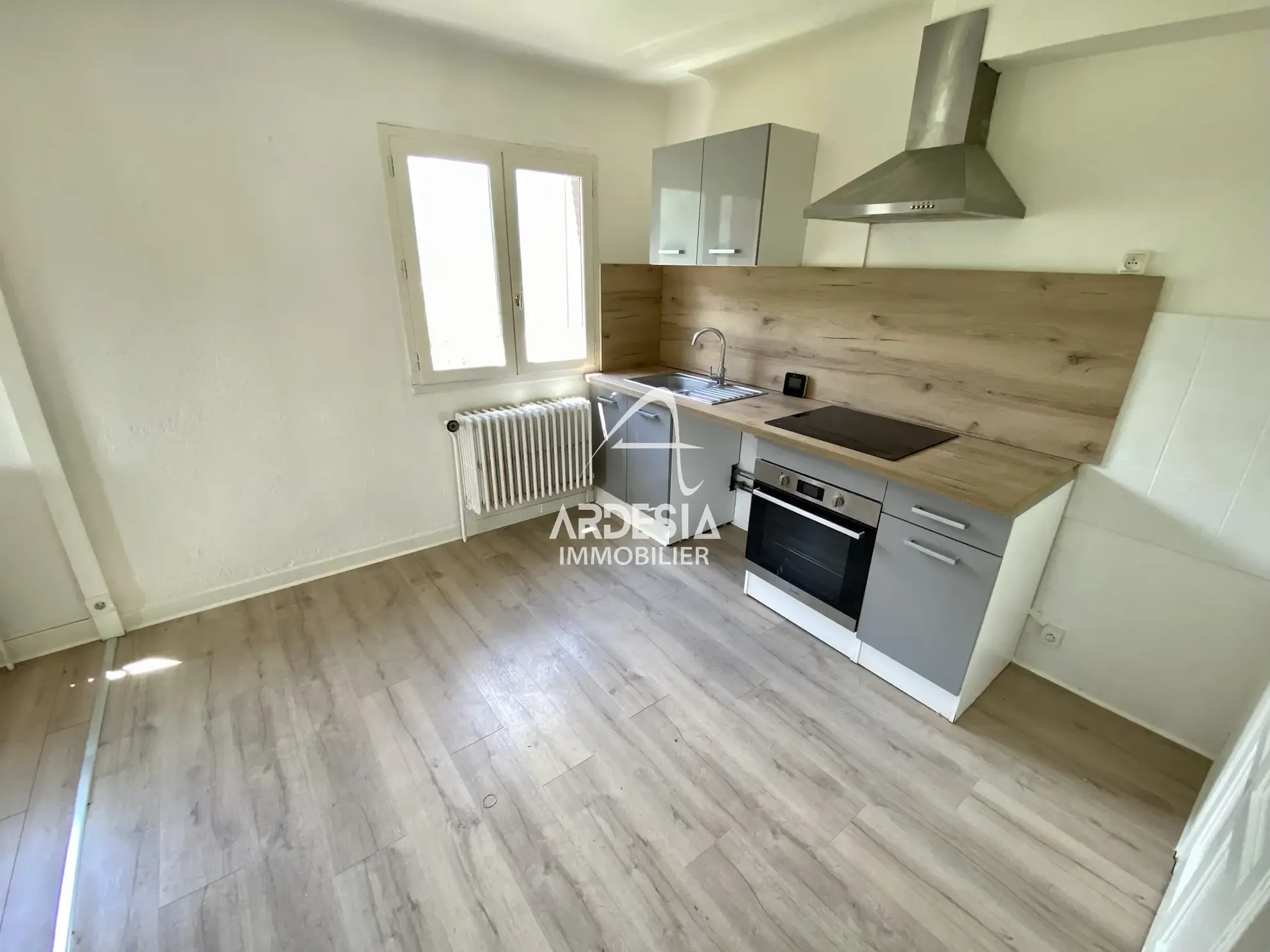 À Vendre : Appartement T3 avec Jardin et Garage à Saint-Julien-Mont-Denis 