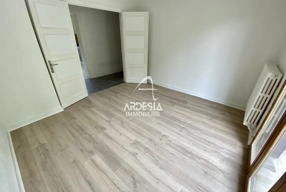 À Vendre : Appartement T3 avec Jardin et Garage à Saint-Julien-Mont-Denis 