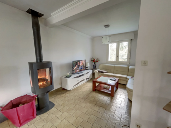 Maison des années 80 à Pluvigner avec jardin 