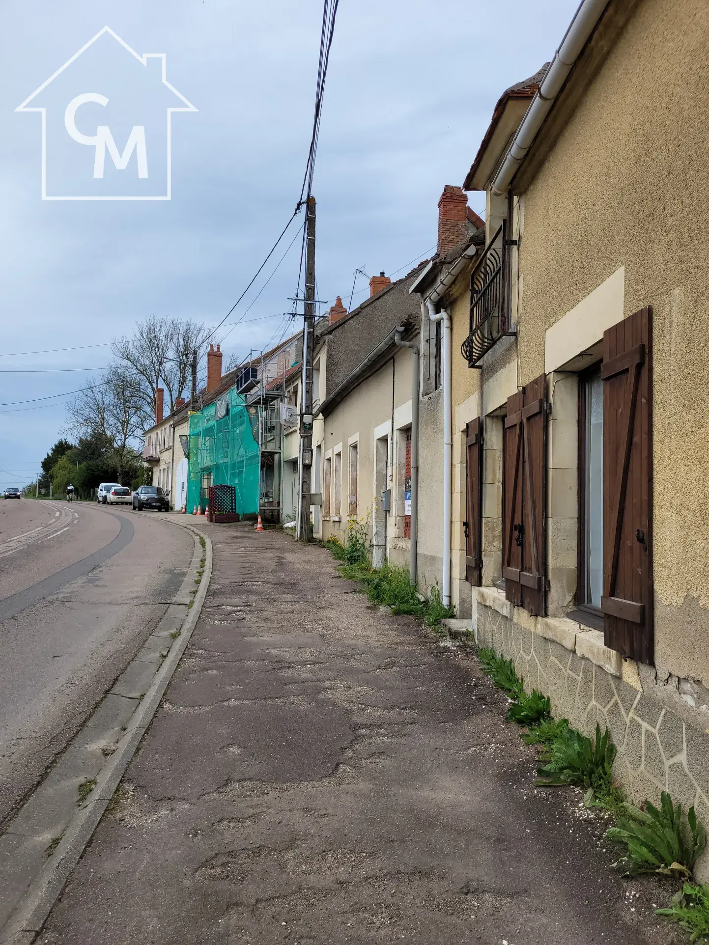 Maison de ville 3 pièces à rénover avec jardinet à Pougny 
