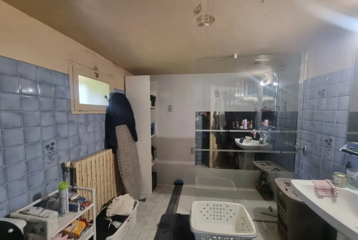 Longère spacieuse au Mêle-sur-Sarthe avec 2 chambres 