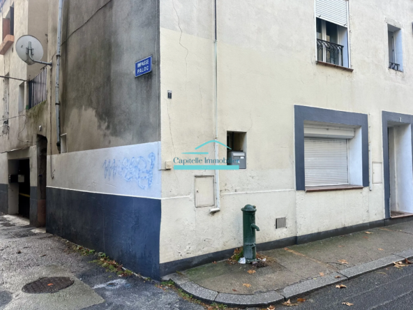 Vente d'un appartement T4 à Lodève avec cour et cave 