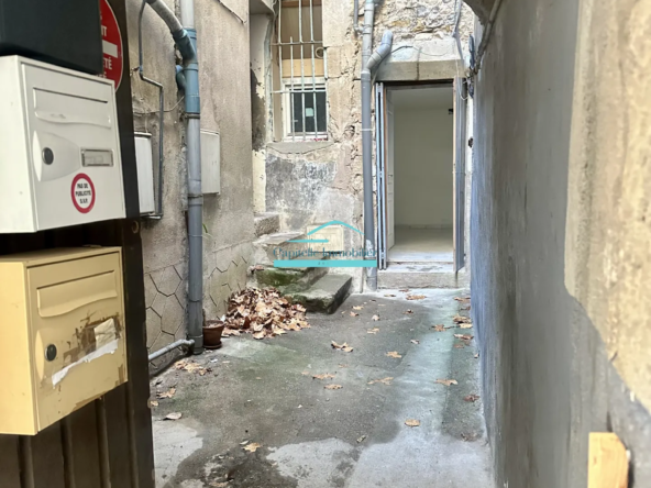 Vente d'un appartement T4 à Lodève avec cour et cave 