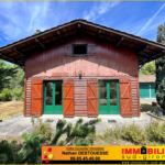 Maison en bois type chalet avec garage à Saint-Michel de Rieufret