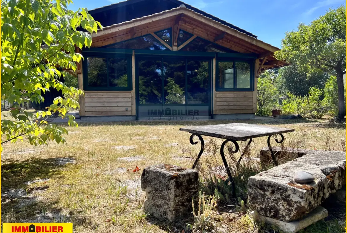 Maison en bois type chalet avec garage à Saint-Michel de Rieufret 