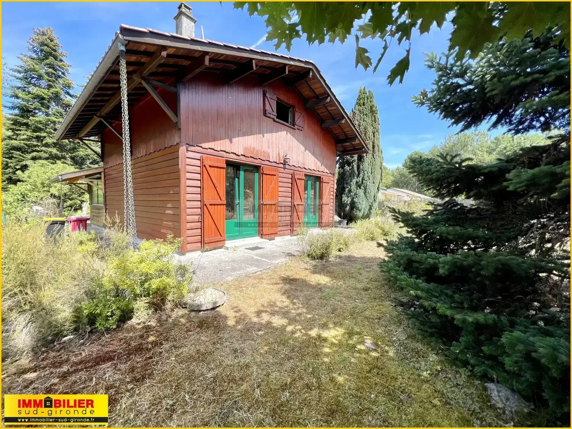 Maison en bois type chalet avec garage à Saint-Michel de Rieufret 