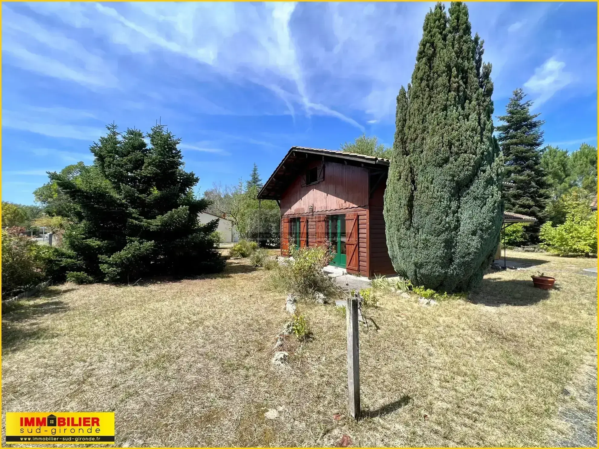 Maison en bois type chalet avec garage à Saint-Michel de Rieufret 