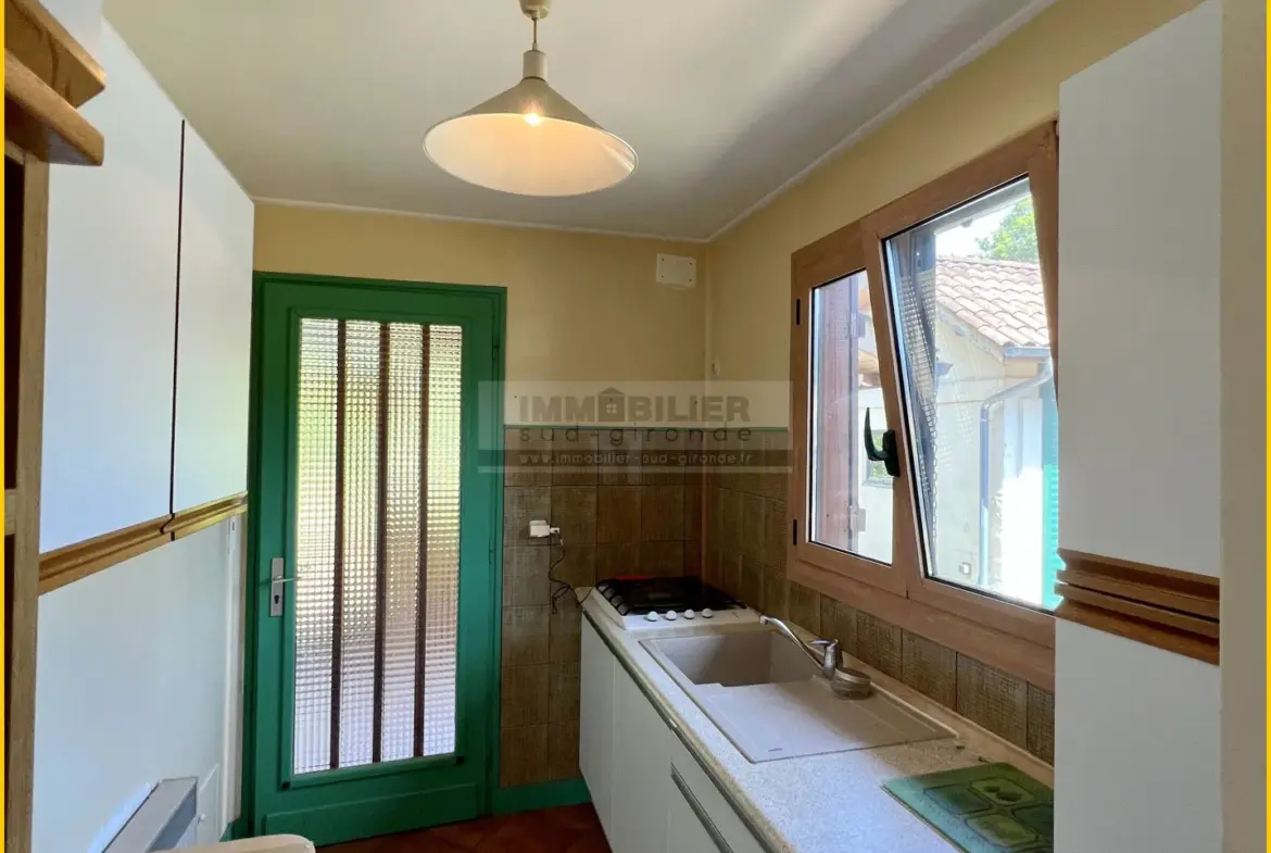 Maison en bois type chalet avec garage à Saint-Michel de Rieufret 