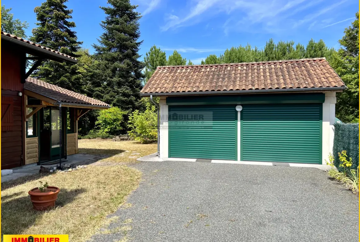 Maison en bois type chalet avec garage à Saint-Michel de Rieufret 