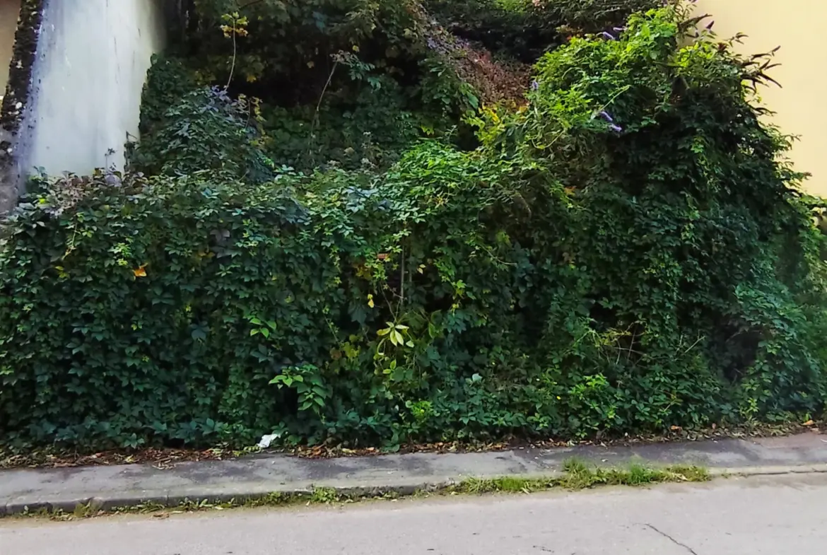 Terrain constructible de 450m2 à Osny à vendre 